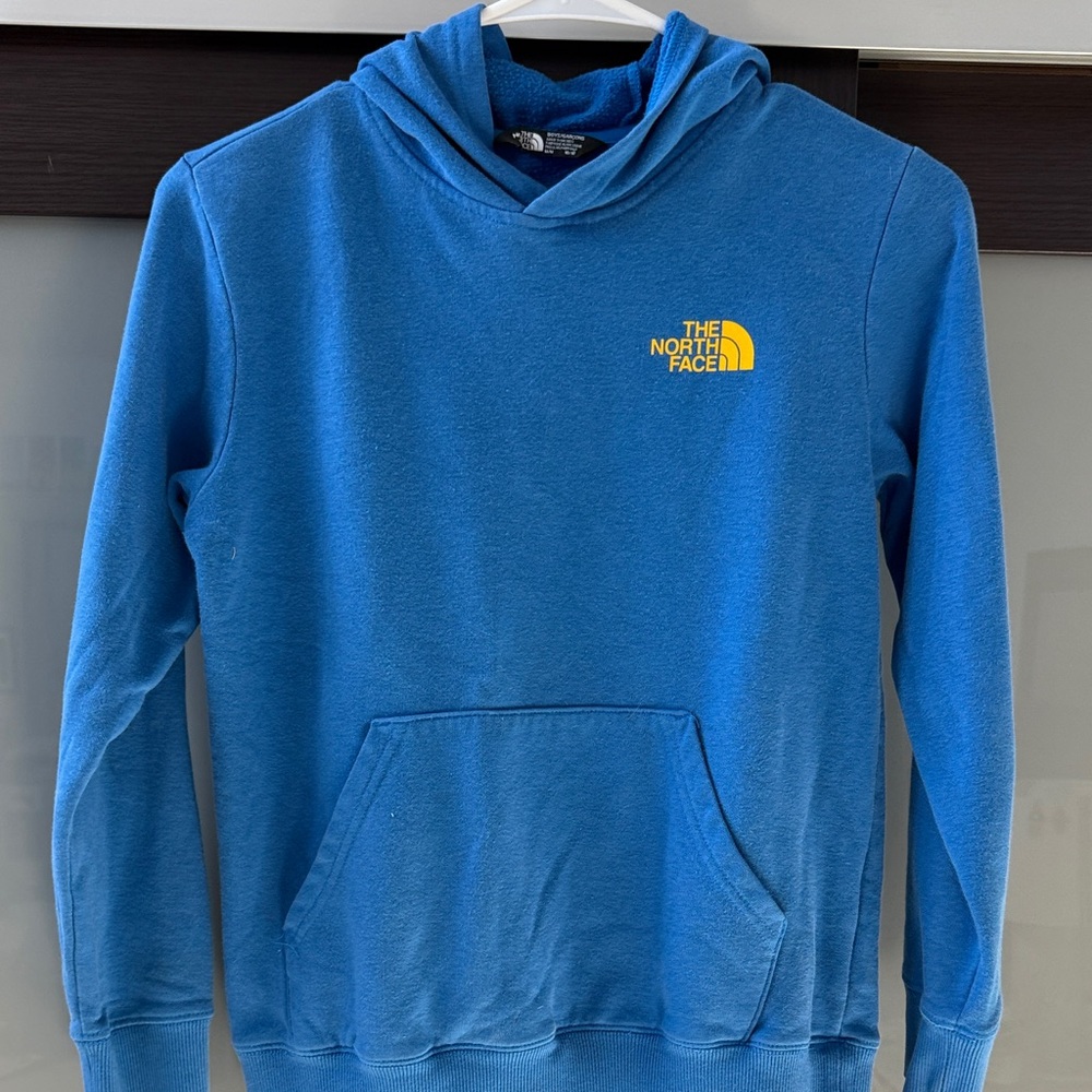 The North Face BOY’S Blue Hoodie with Yellow Logo